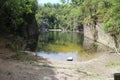 Flooded stone quarry in ÃÂ tÃâºnovice, PlzeÃË region Royalty Free Stock Photo